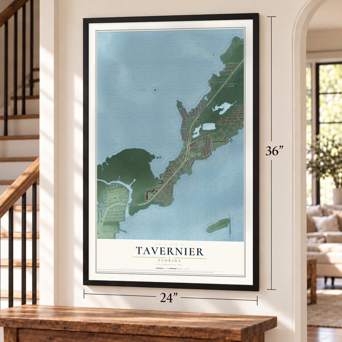 Tavernier, Florida map, 24 x 36 inch print in a black frame by a staircase