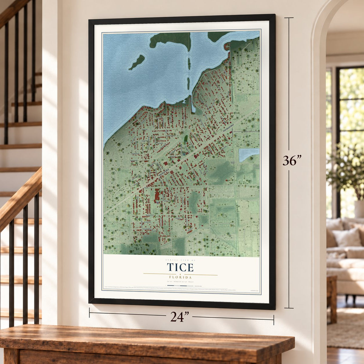 Tice, Florida map, 24 x 36 inch print in a black frame by a staircase