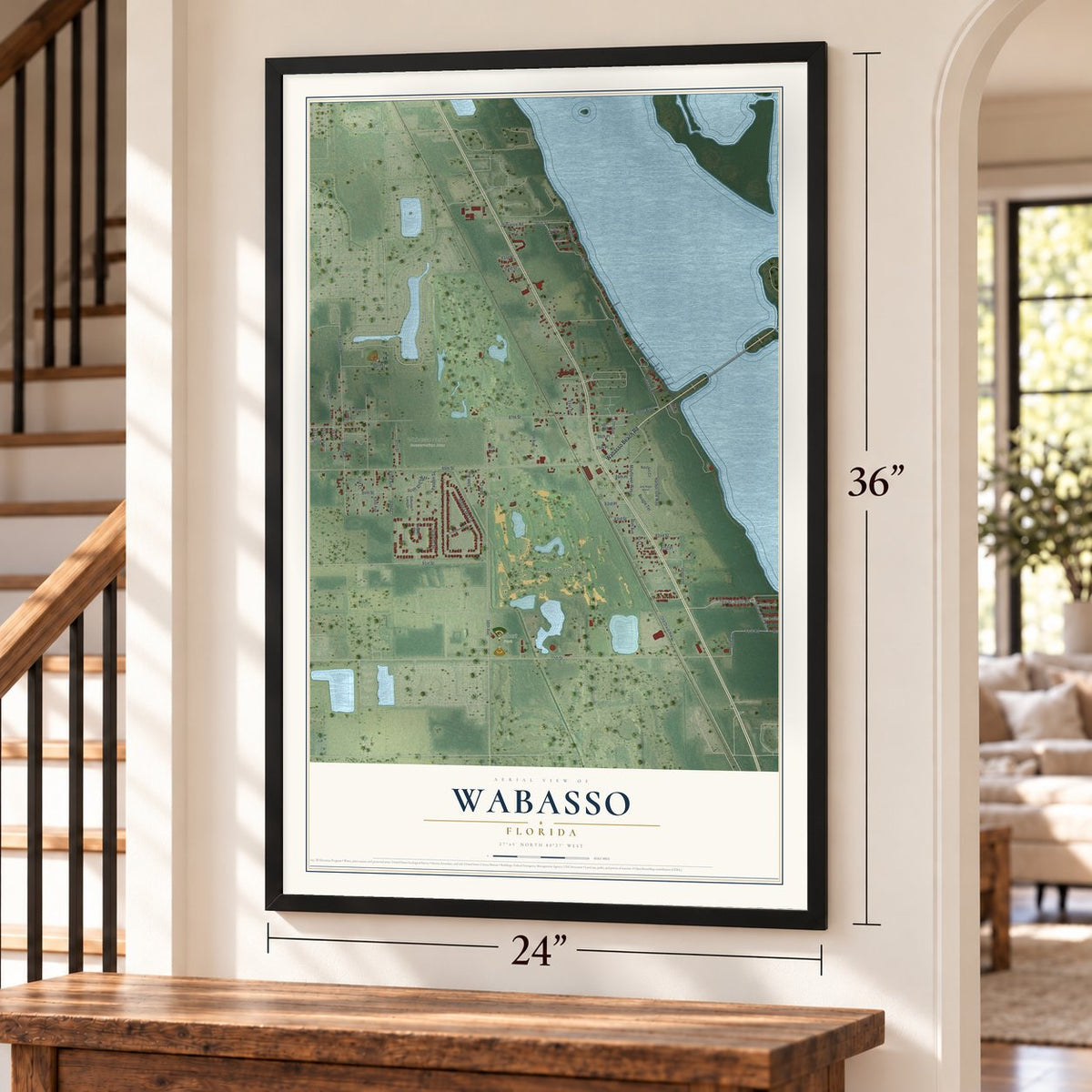 Wabasso, Florida map, 24 x 36 inch print in a black frame by a staircase