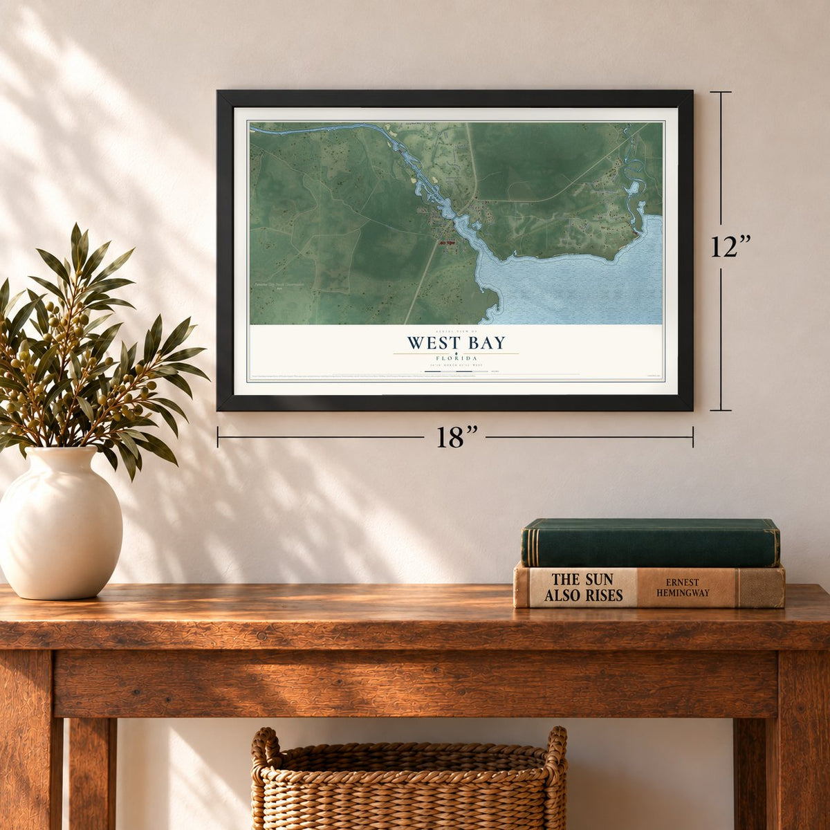 West Bay, Florida map, 12 x 18 inch print in a black frame in an entryway