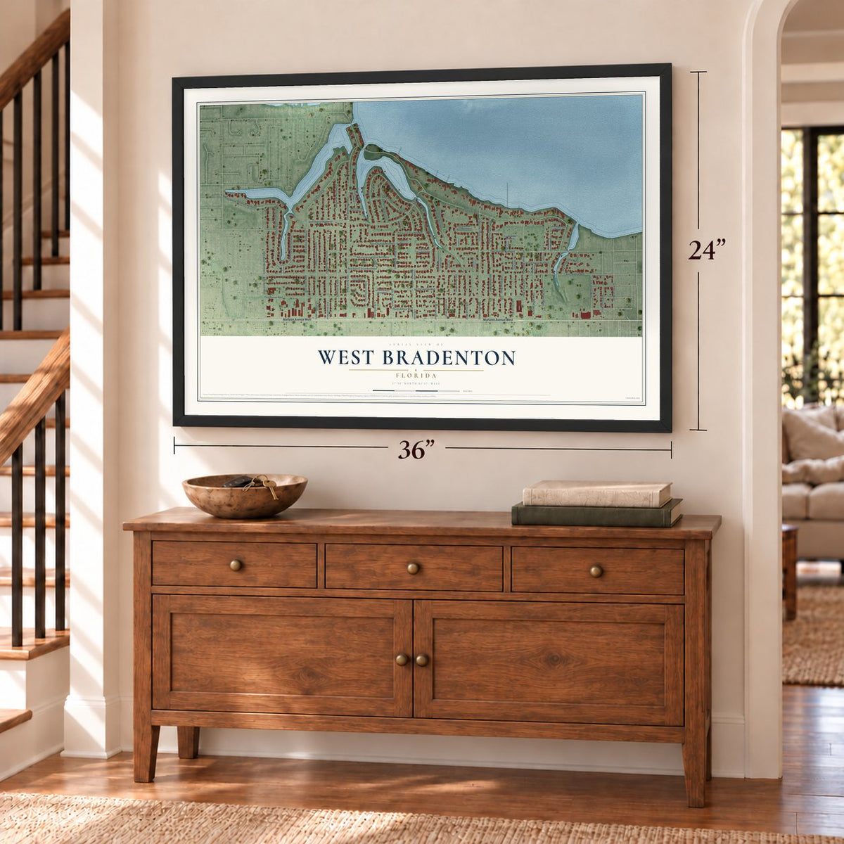 West Bradenton, Florida map, 24 x 36 inch print in a black frame above a dresser by a staircase