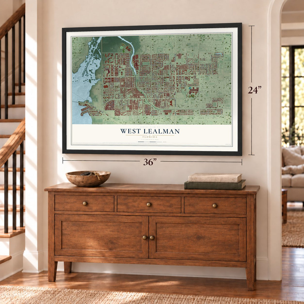 West Lealman, Florida map, 24 x 36 inch print in a black frame above a dresser by a staircase