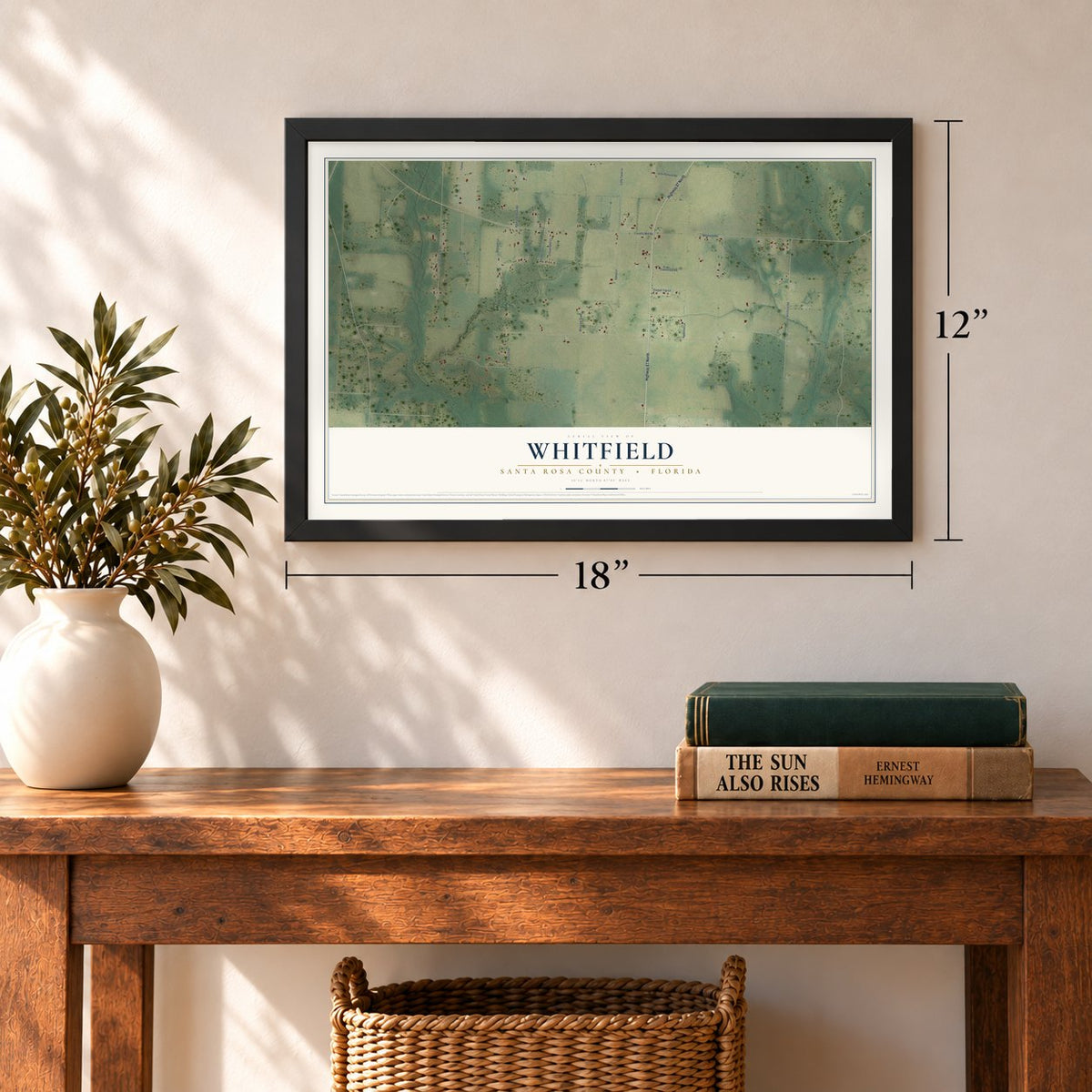 Whitfield, Santa Rosa County, Florida map, 12 x 18 inch print in a black frame in an entryway
