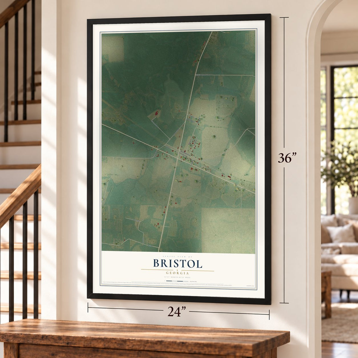 Bristol, Georgia map, 24 x 36 inch print in a black frame by a staircase