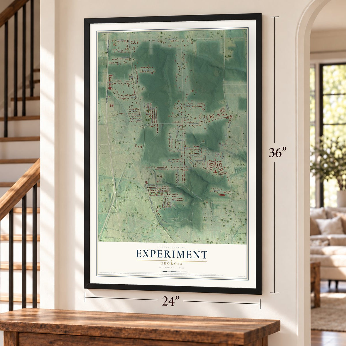 Experiment, Georgia map, 24 x 36 inch print in a black frame by a staircase