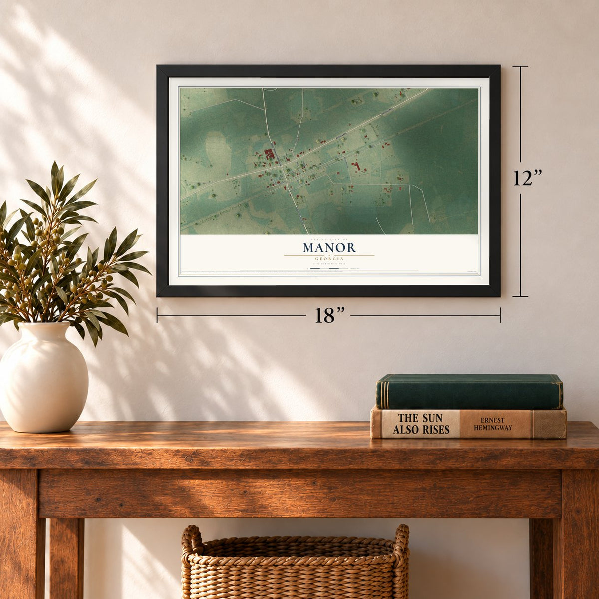Manor, Georgia map, 12 x 18 inch print in a black frame in an entryway