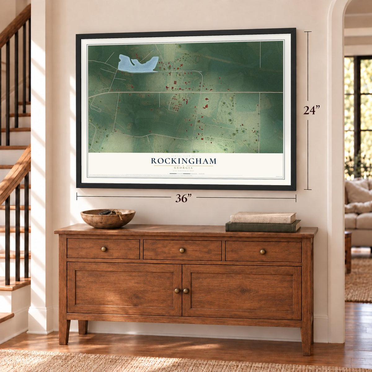 Rockingham, Georgia map, 24 x 36 inch print in a black frame above a dresser by a staircase