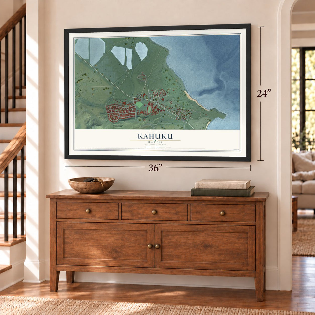 Kahuku, Hawaii map, 24 x 36 inch print in a black frame above a dresser by a staircase