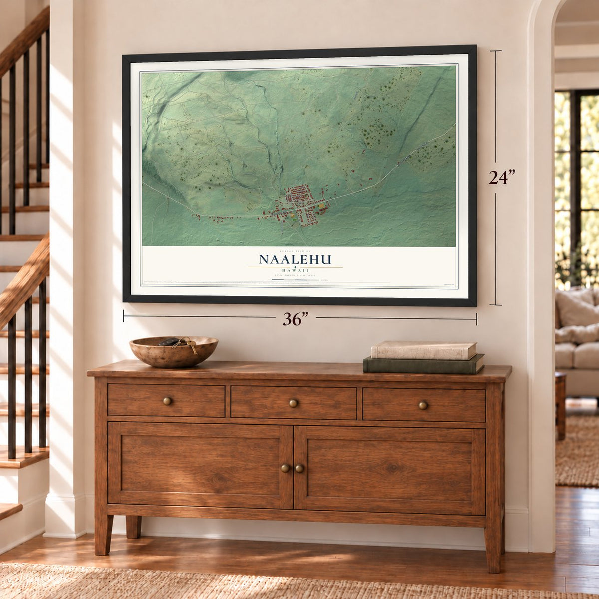 Naalehu, Hawaii map, 24 x 36 inch print in a black frame above a dresser by a staircase