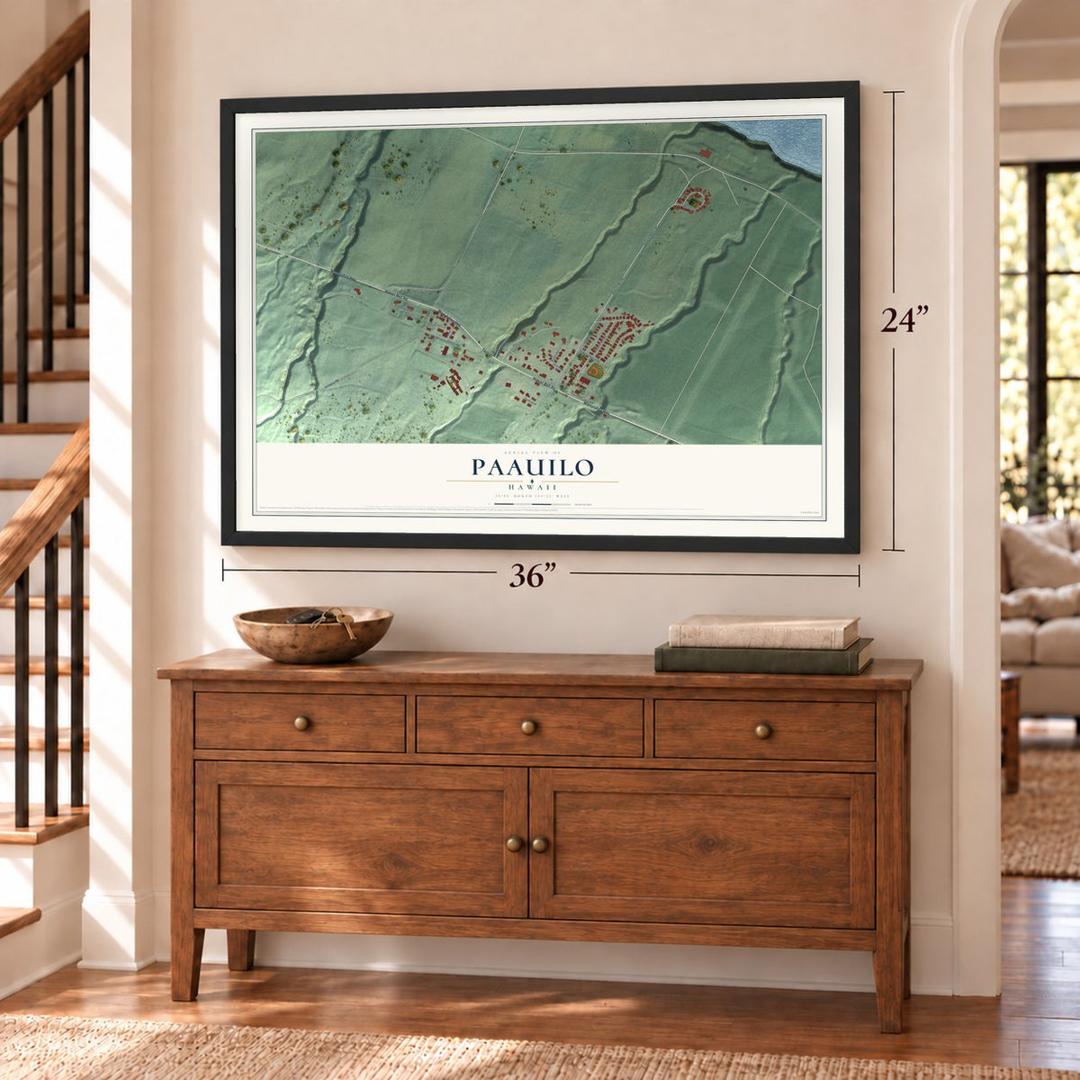 Paauilo, Hawaii map, 24 x 36 inch print in a black frame above a dresser by a staircase