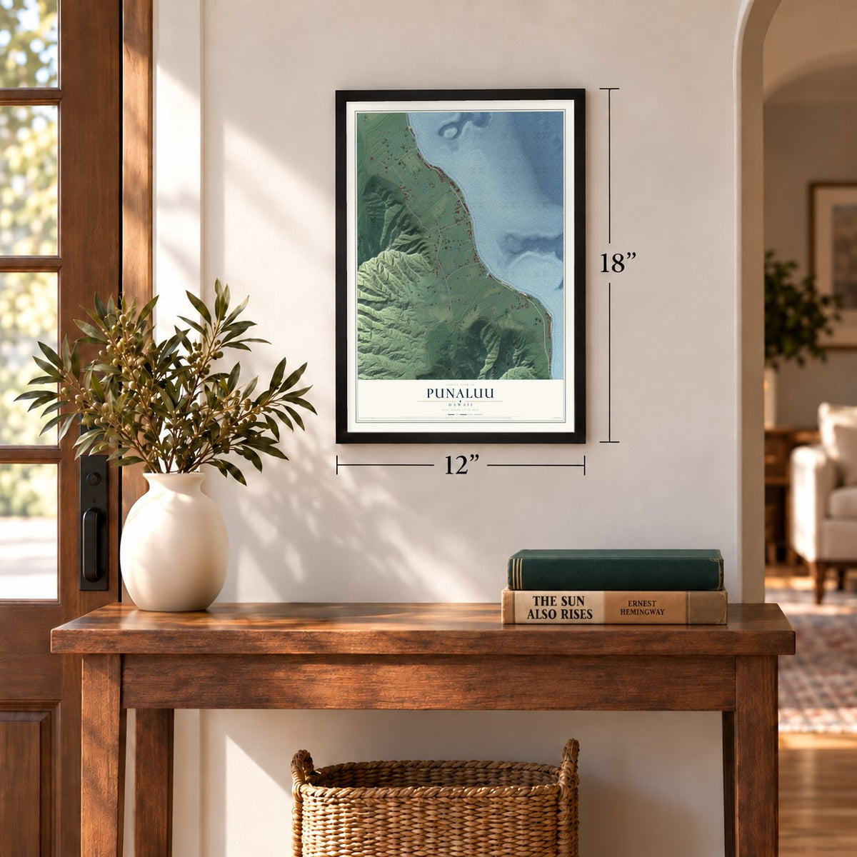 Punaluu, Hawaii map, 12 x 18 inch print in a black frame in an entryway