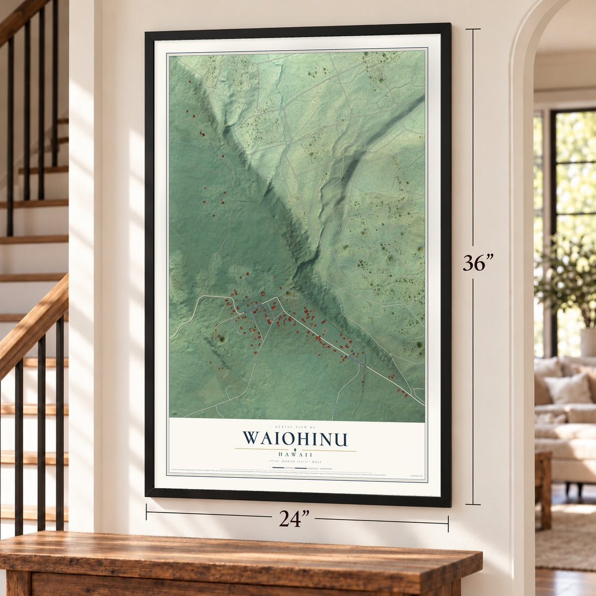 Waiohinu, Hawaii map, 24 x 36 inch print in a black frame by a staircase