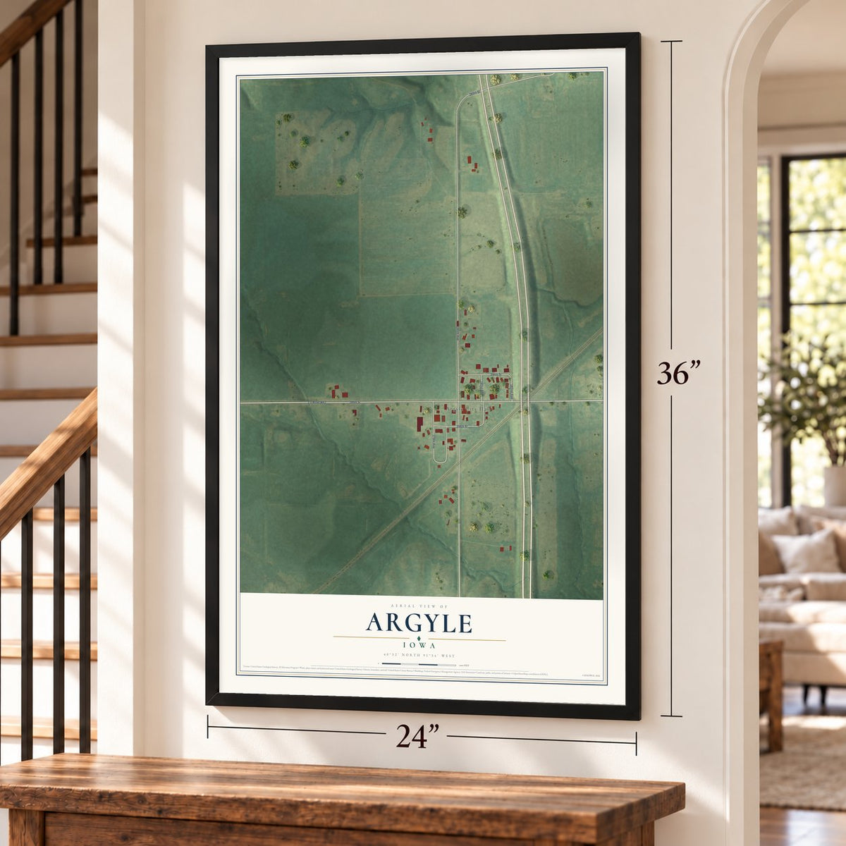 Argyle, Iowa map, 24 x 36 inch print in a black frame by a staircase