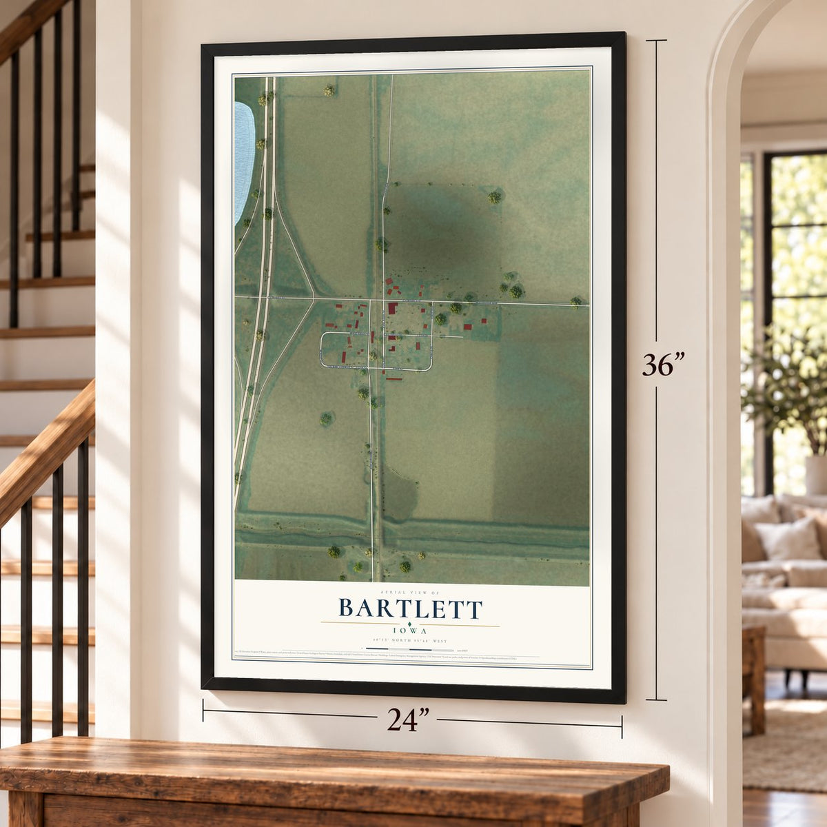 Bartlett, Iowa map, 24 x 36 inch print in a black frame by a staircase