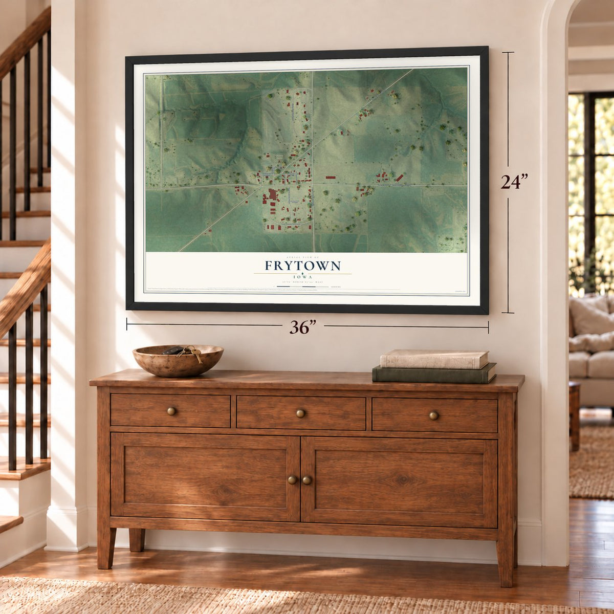 Frytown, Iowa map, 24 x 36 inch print in a black frame above a dresser by a staircase