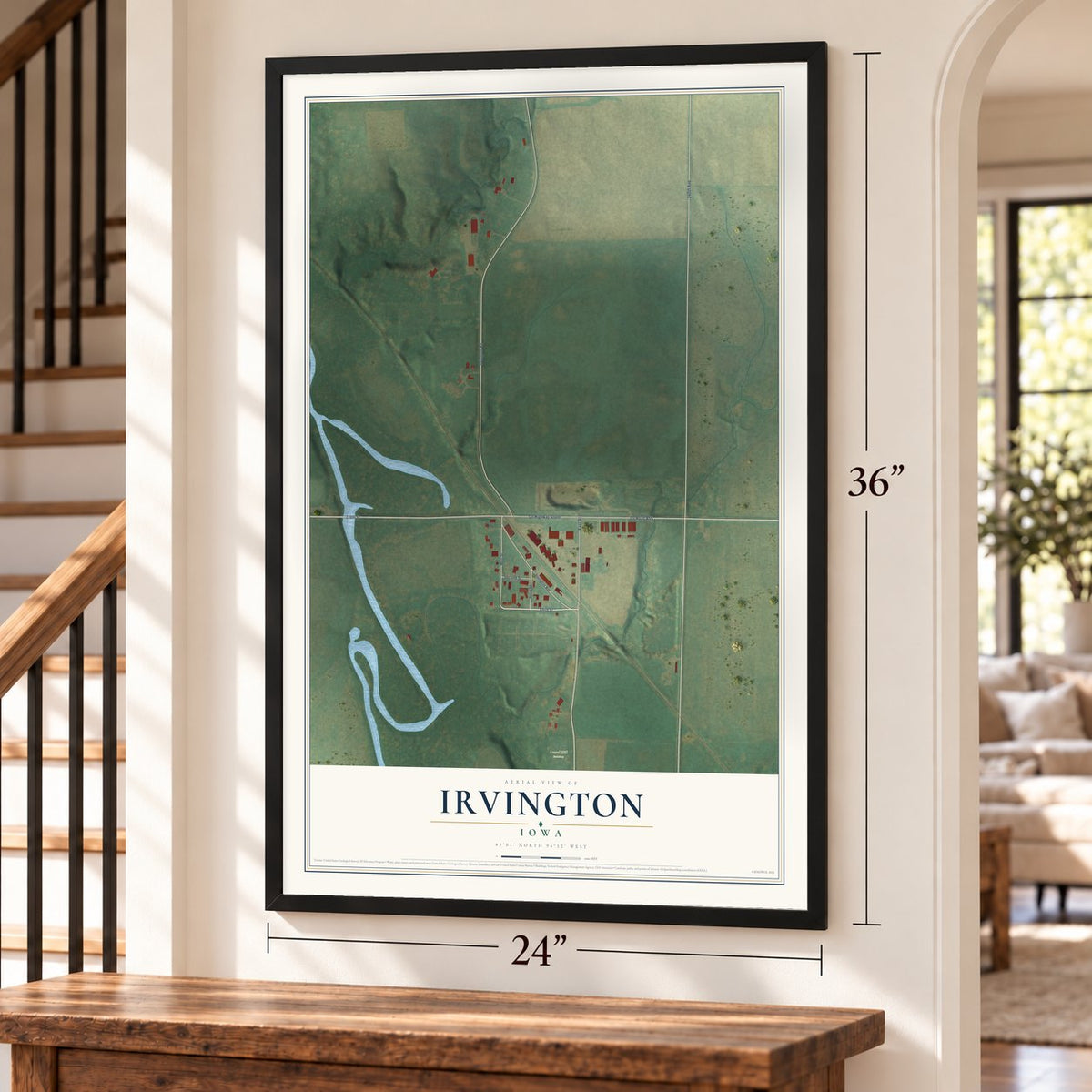 Irvington, Iowa map, 24 x 36 inch print in a black frame by a staircase