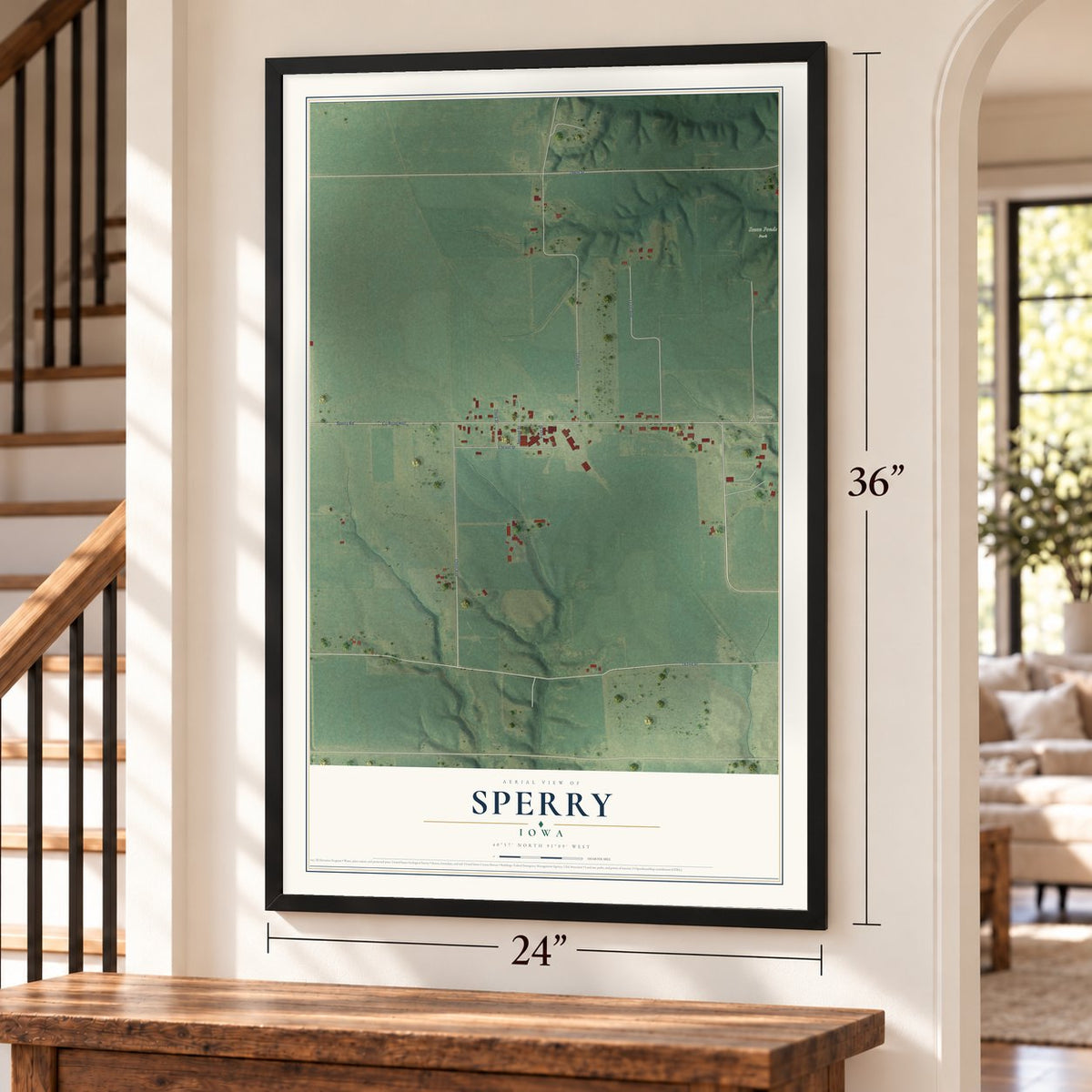 Sperry, Iowa map, 24 x 36 inch print in a black frame by a staircase