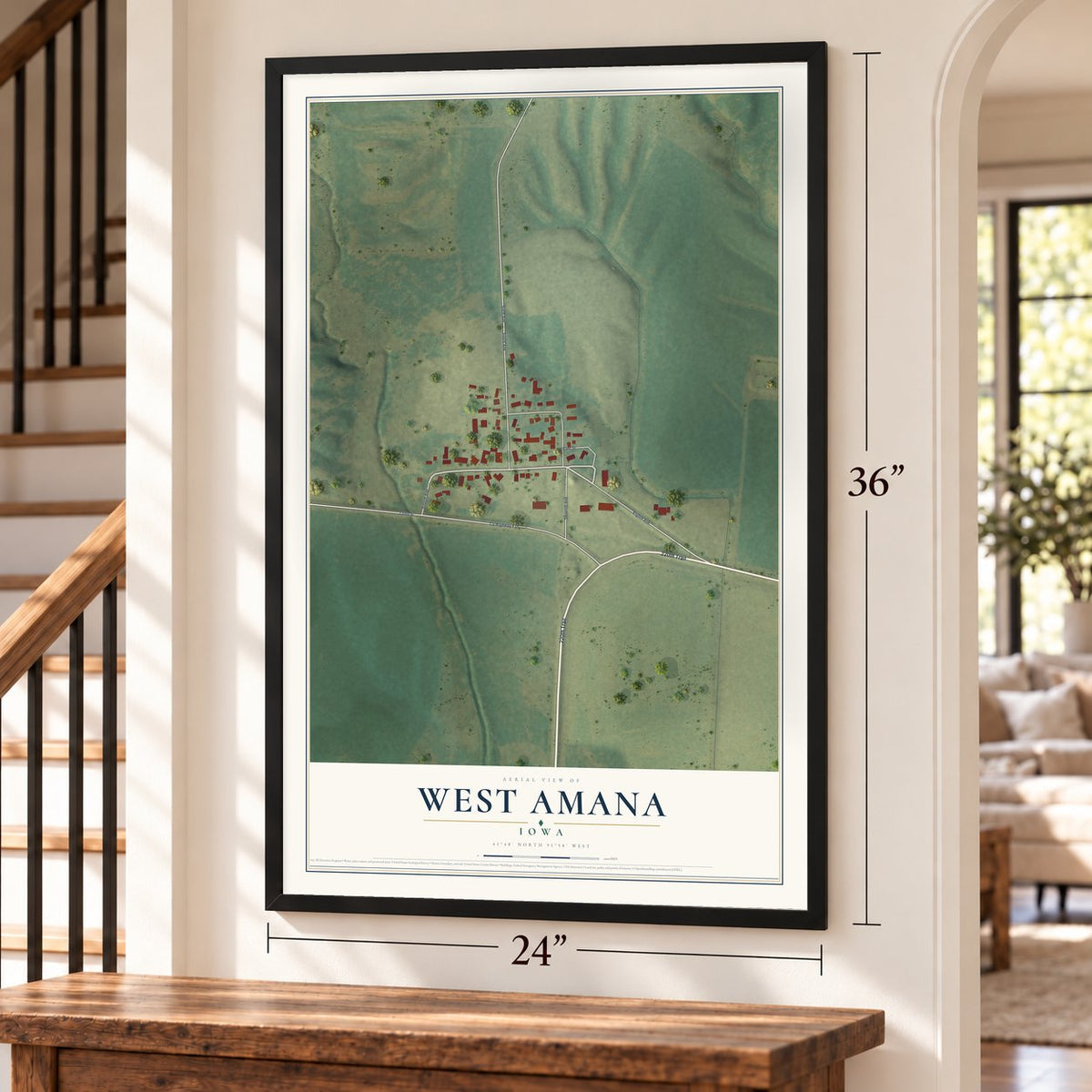 West Amana, Iowa map, 24 x 36 inch print in a black frame by a staircase