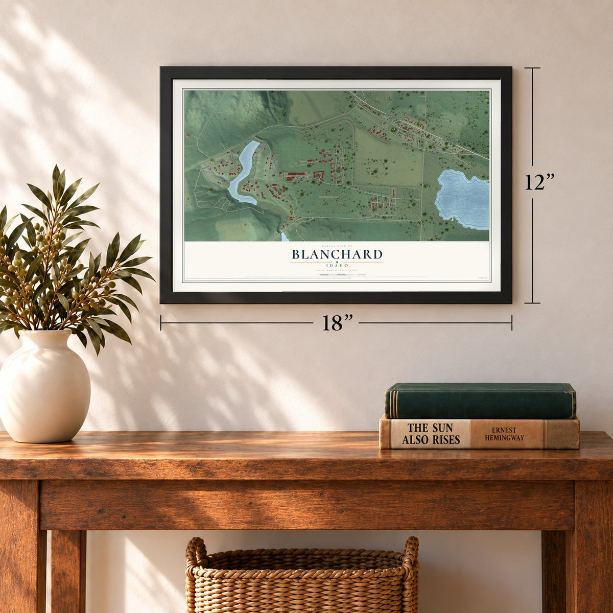 Blanchard, Idaho map, 12 x 18 inch print in a black frame in an entryway