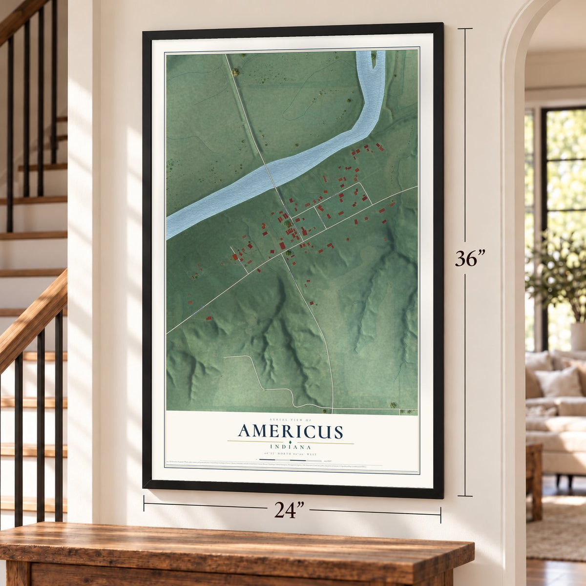 Americus, Indiana map, 24 x 36 inch print in a black frame by a staircase