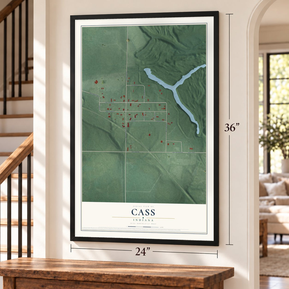 Cass, Indiana map, 24 x 36 inch print in a black frame by a staircase
