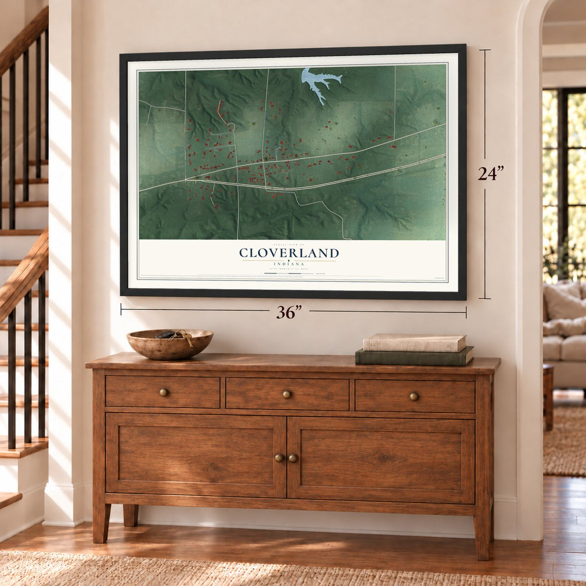 Cloverland, Indiana map, 24 x 36 inch print in a black frame above a dresser by a staircase