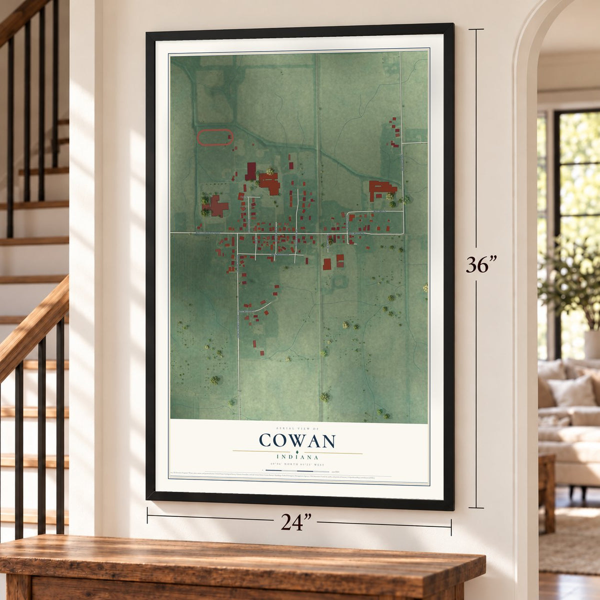 Cowan, Indiana map, 24 x 36 inch print in a black frame by a staircase