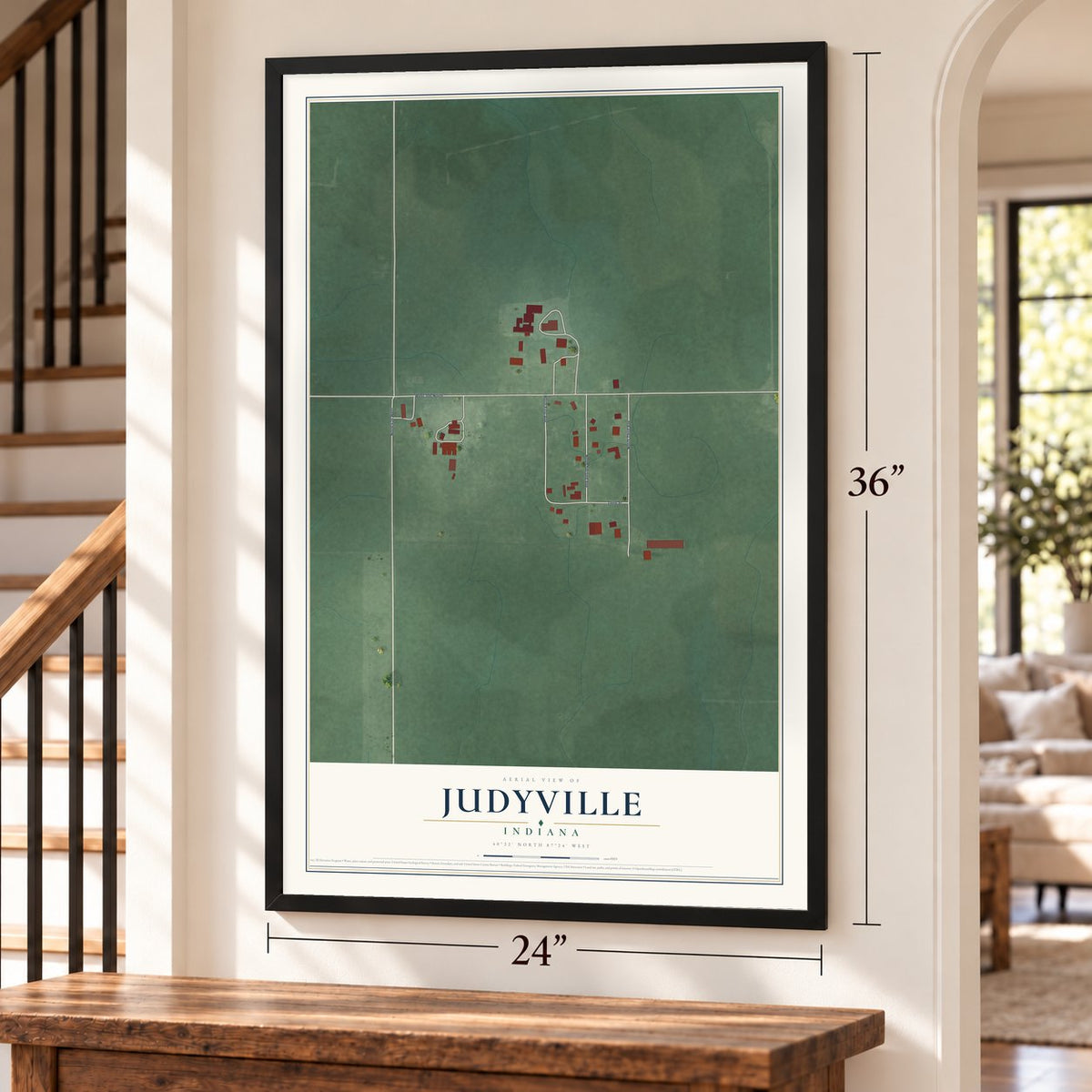 Judyville, Indiana map, 24 x 36 inch print in a black frame by a staircase