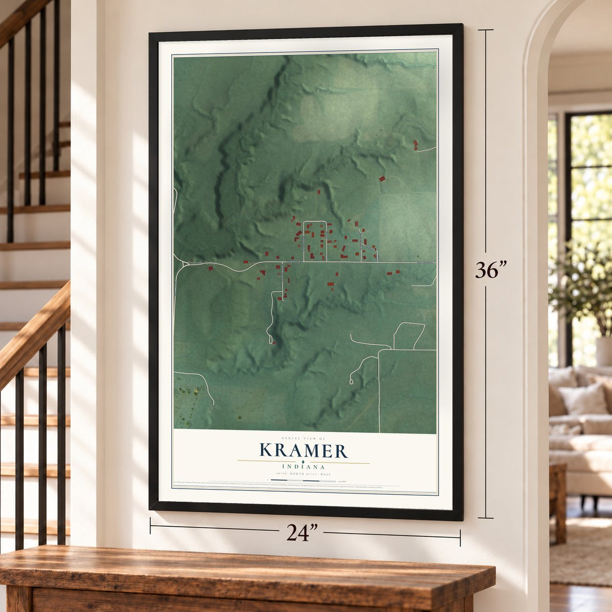 Kramer, Indiana map, 24 x 36 inch print in a black frame by a staircase