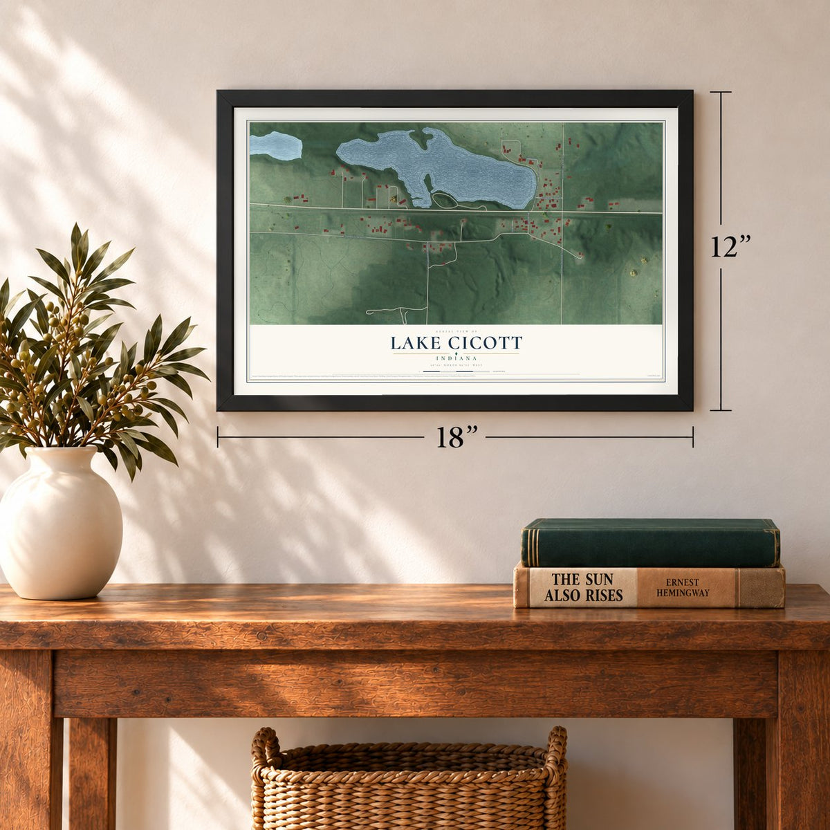 Lake Cicott, Indiana map, 12 x 18 inch print in a black frame in an entryway