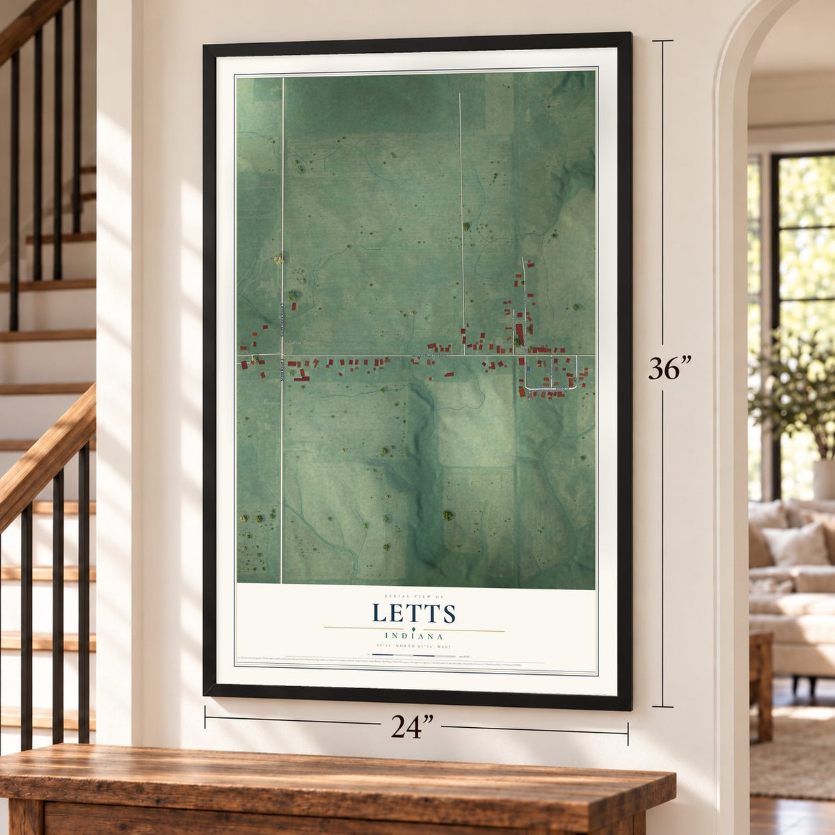 Letts, Indiana map, 24 x 36 inch print in a black frame by a staircase