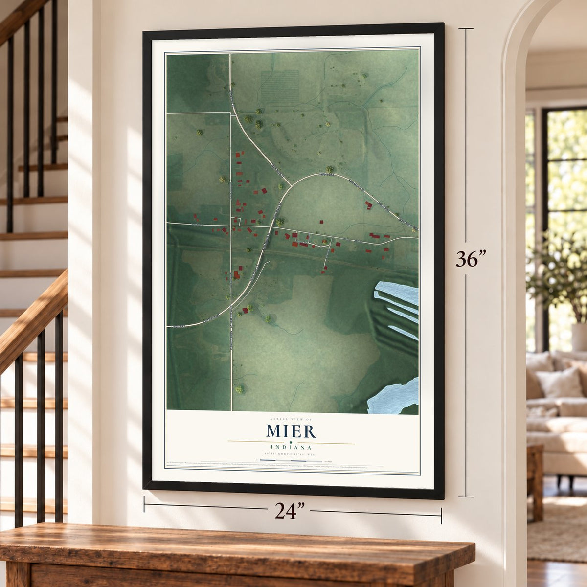 Mier, Indiana map, 24 x 36 inch print in a black frame by a staircase