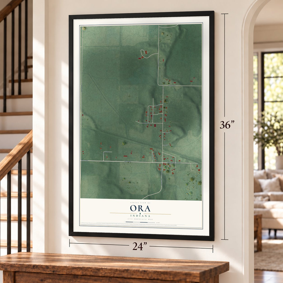 Ora, Indiana map, 24 x 36 inch print in a black frame by a staircase