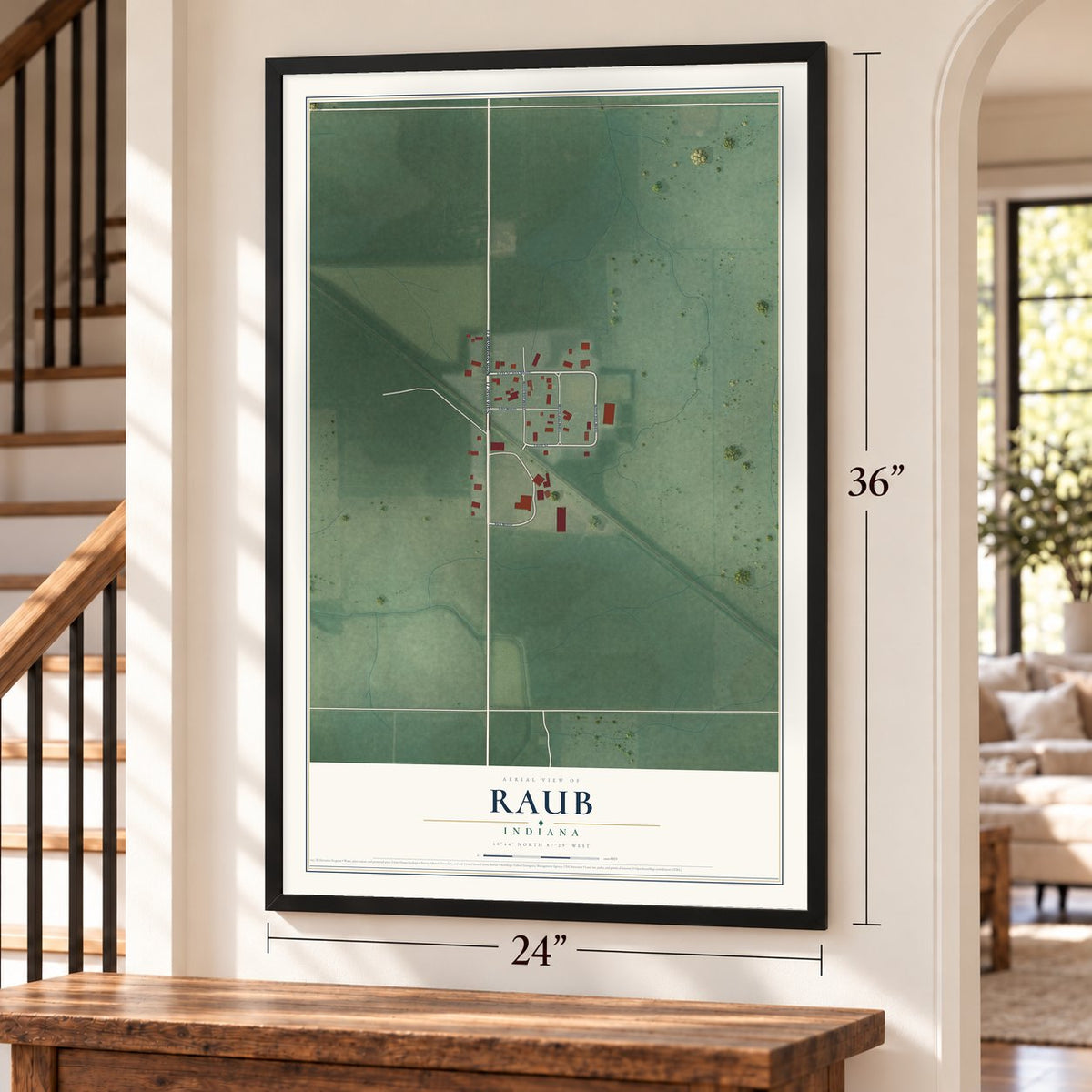 Raub, Indiana map, 24 x 36 inch print in a black frame by a staircase