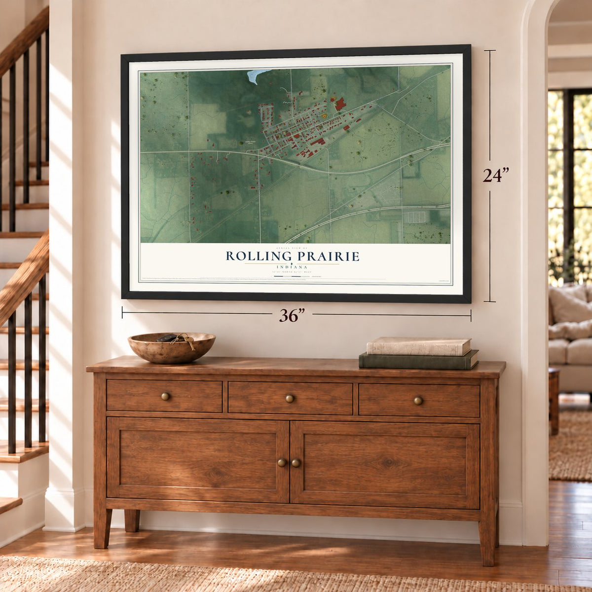 Rolling Prairie, Indiana map, 24 x 36 inch print in a black frame above a dresser by a staircase