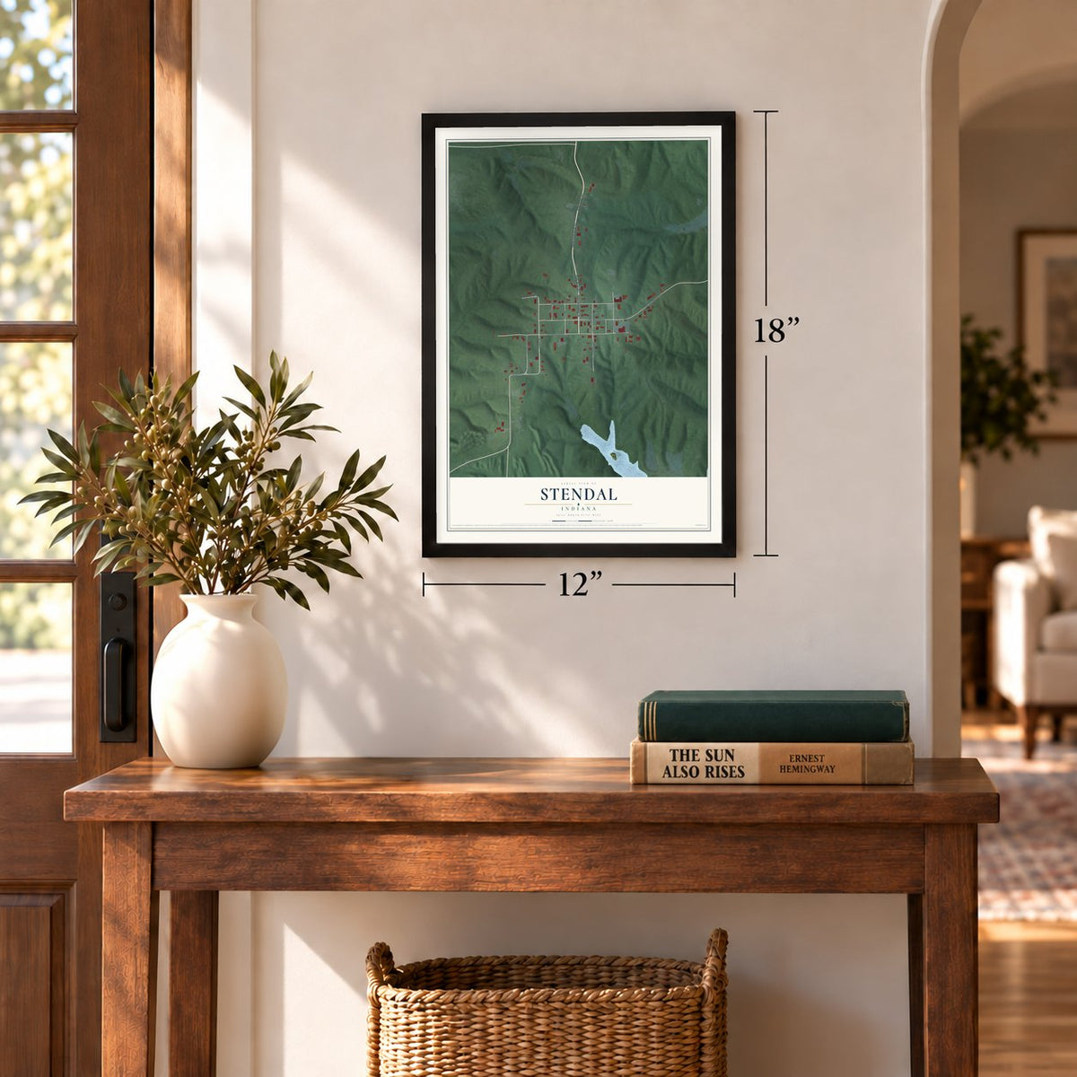 Stendal, Indiana map, 12 x 18 inch print in a black frame in an entryway