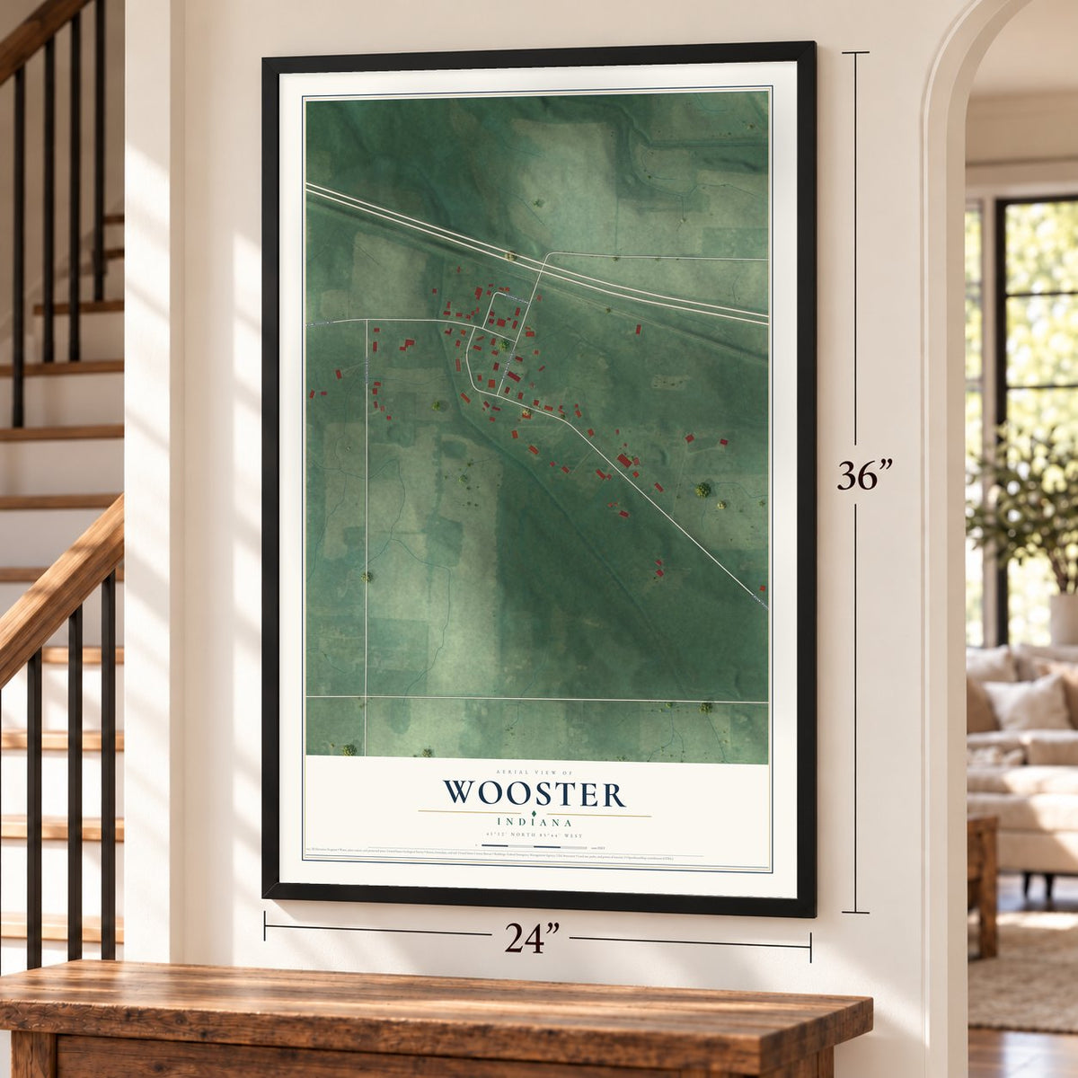 Wooster, Indiana map, 24 x 36 inch print in a black frame by a staircase
