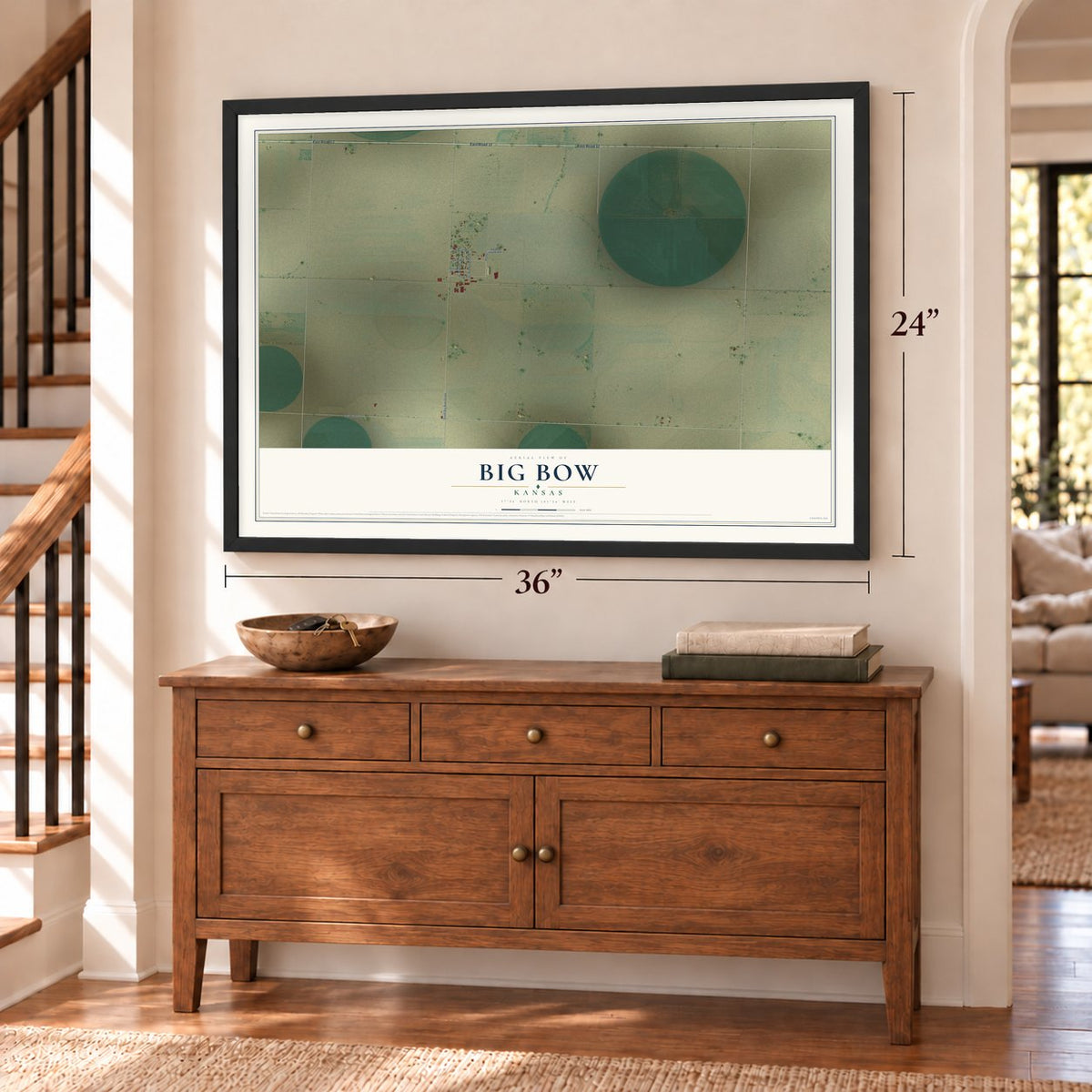 Big Bow, Kansas map, 24 x 36 inch print in a black frame above a dresser by a staircase
