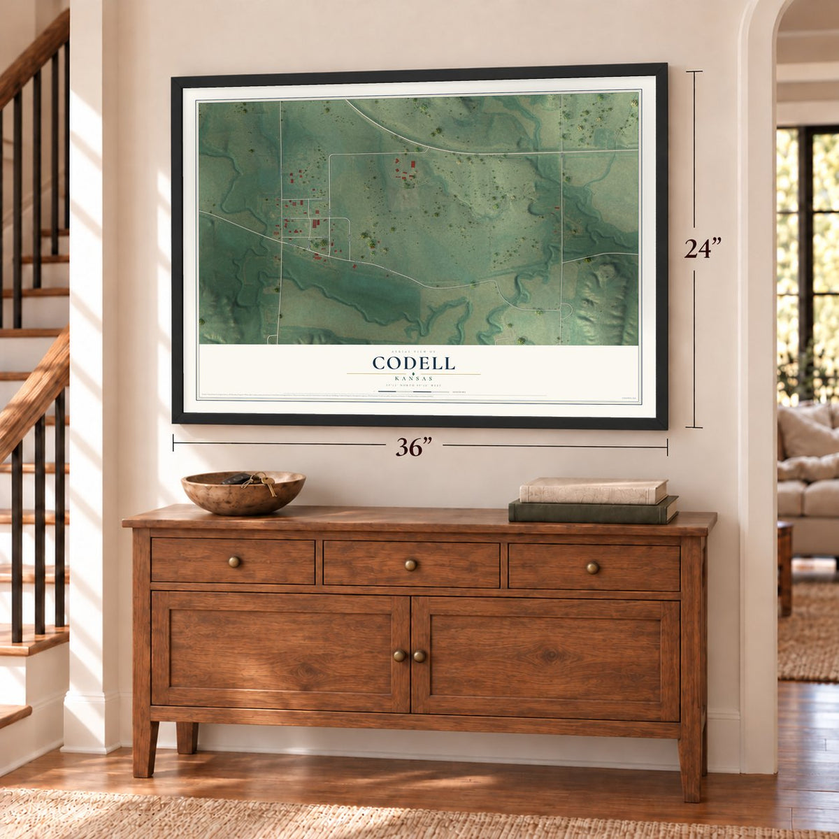 Codell, Kansas map, 24 x 36 inch print in a black frame above a dresser by a staircase