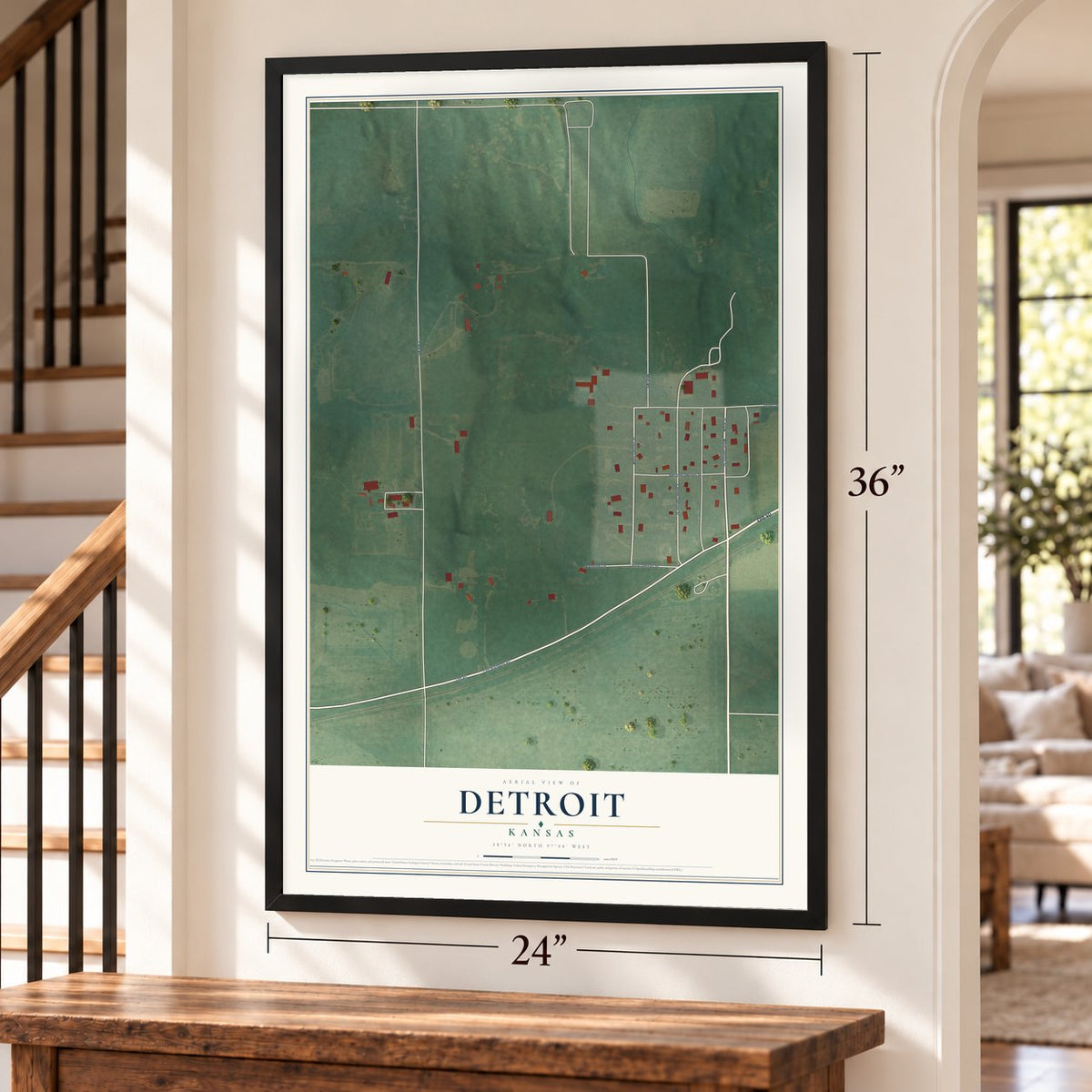 Detroit, Kansas map, 24 x 36 inch print in a black frame by a staircase