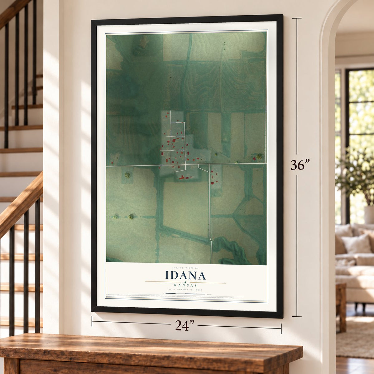 Idana, Kansas map, 24 x 36 inch print in a black frame by a staircase