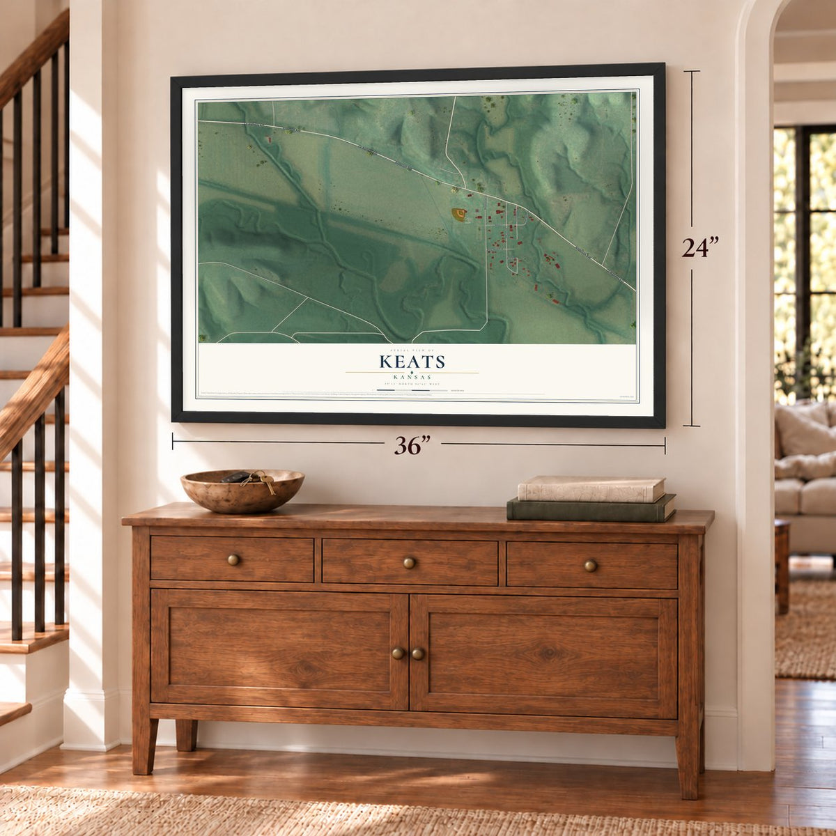 Keats, Kansas map, 24 x 36 inch print in a black frame above a dresser by a staircase