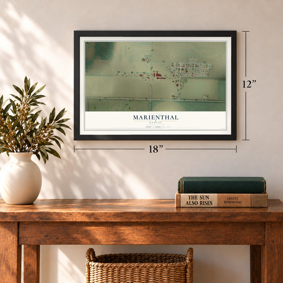 Marienthal, Kansas map, 12 x 18 inch print in a black frame in an entryway
