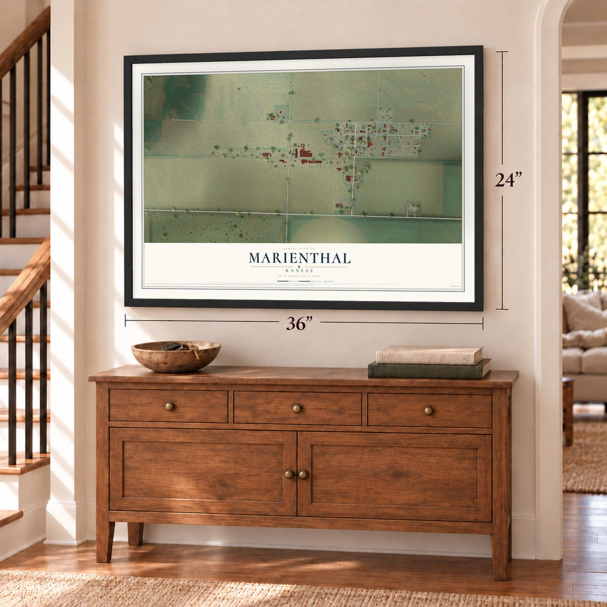 Marienthal, Kansas map, 24 x 36 inch print in a black frame above a dresser by a staircase