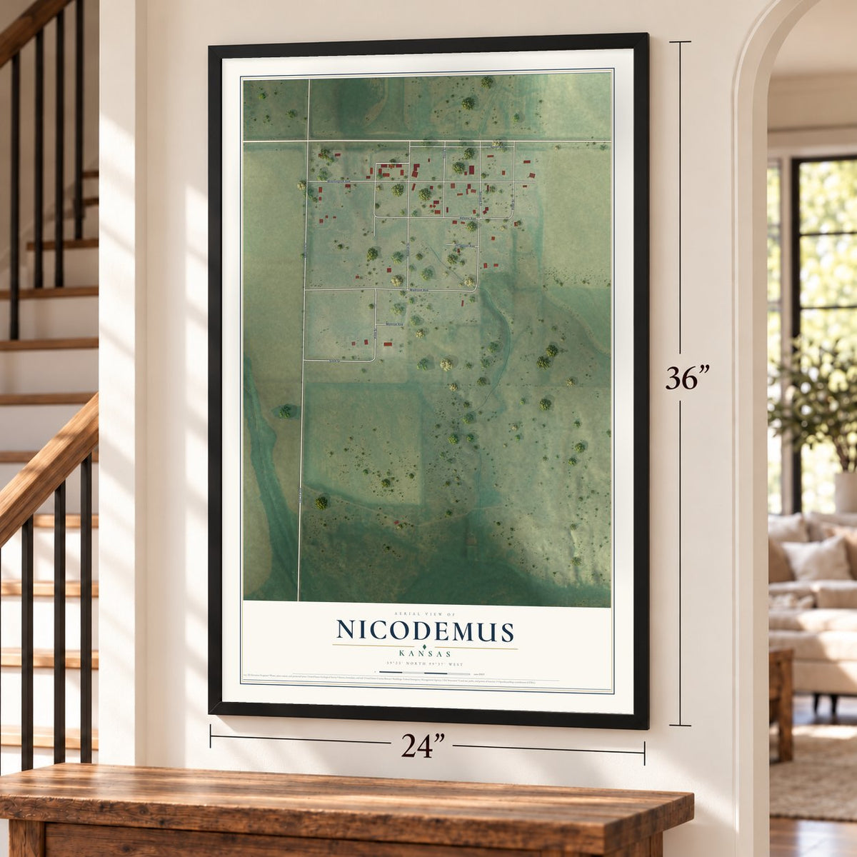 Nicodemus, Kansas map, 24 x 36 inch print in a black frame by a staircase