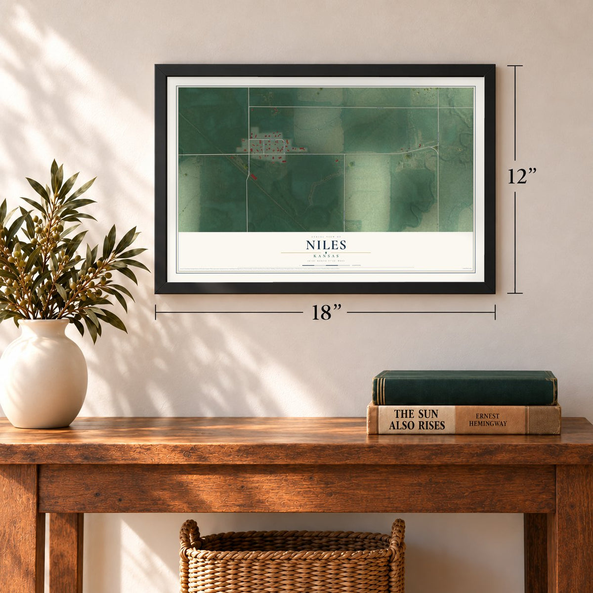 Niles, Kansas map, 12 x 18 inch print in a black frame in an entryway