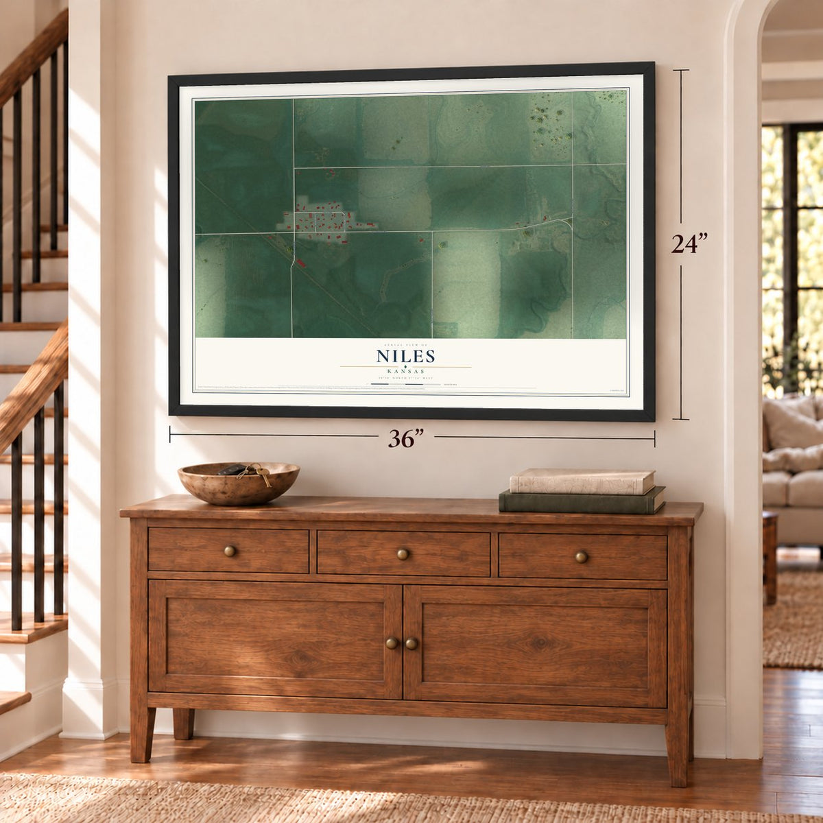 Niles, Kansas map, 24 x 36 inch print in a black frame above a dresser by a staircase