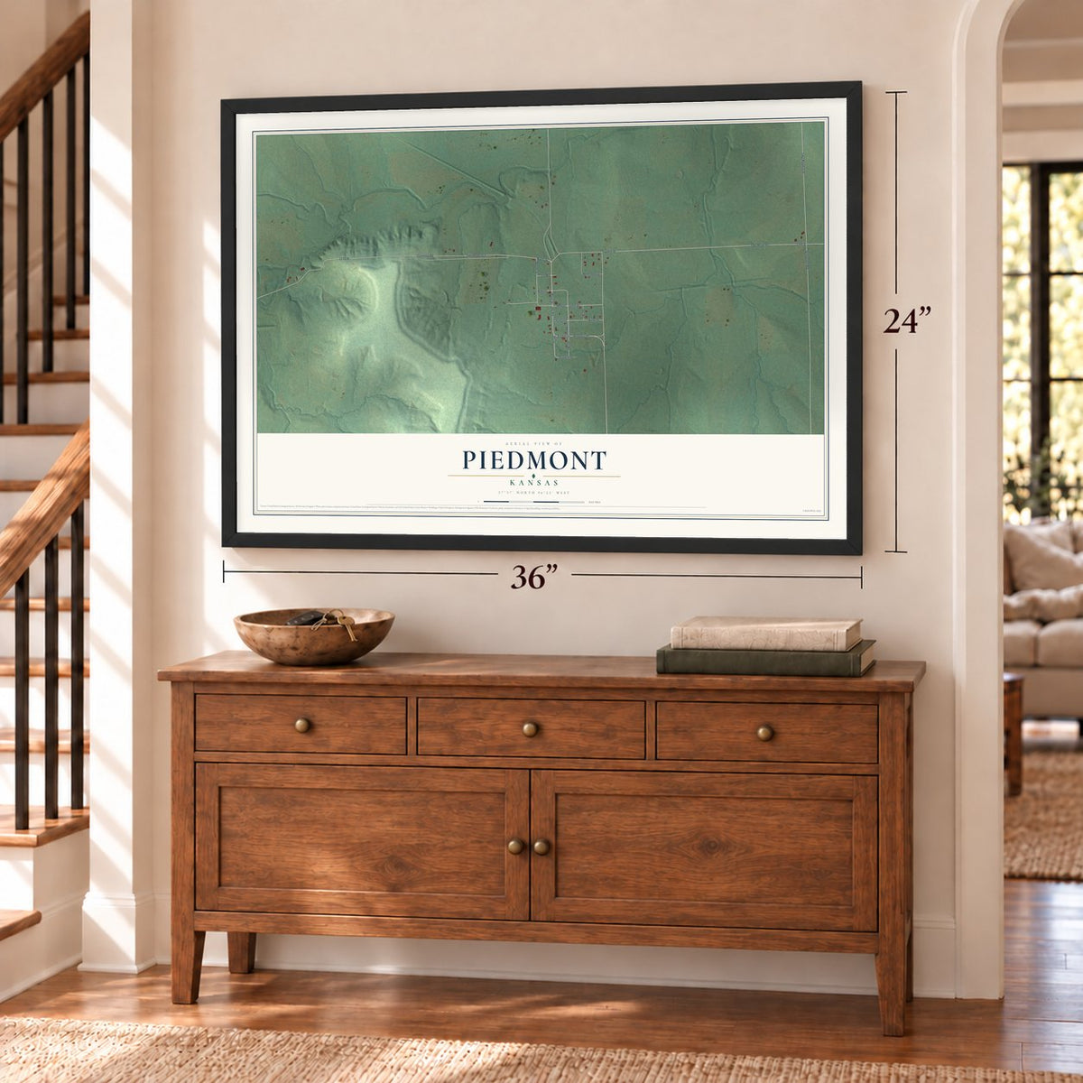 Piedmont, Kansas map, 24 x 36 inch print in a black frame above a dresser by a staircase