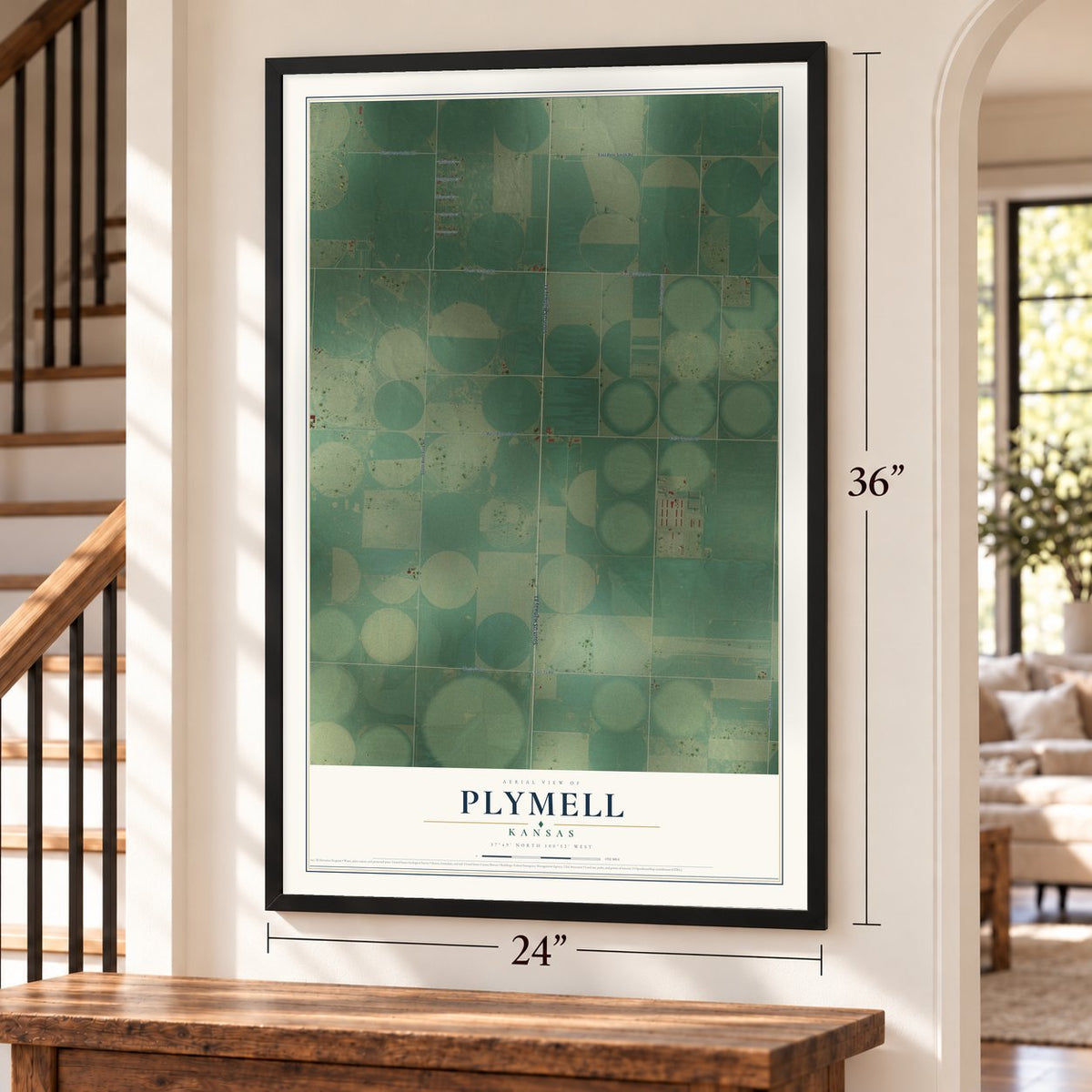 Plymell, Kansas map, 24 x 36 inch print in a black frame by a staircase