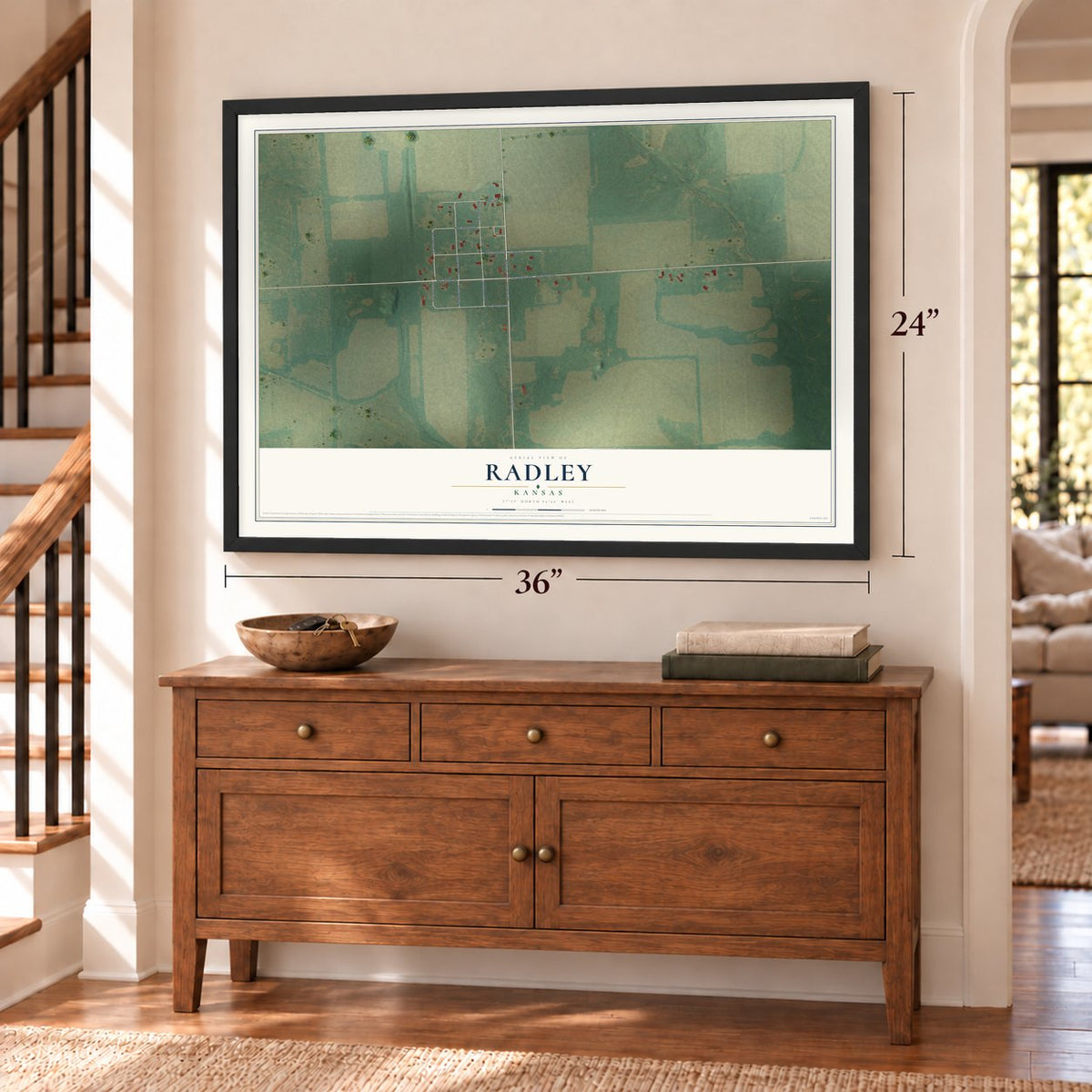 Radley, Kansas map, 24 x 36 inch print in a black frame above a dresser by a staircase